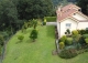 Caxidi. Cangas de Onís. Casa en venta con amplio jardín y piscina