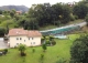 Caxidi. Cangas de Onís. Casa en venta con amplio jardín y piscina